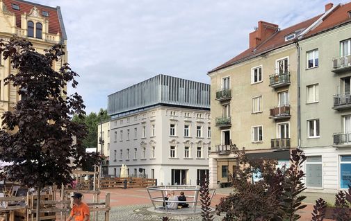 Extension of a historic tenement house Extension of a historic tenement house